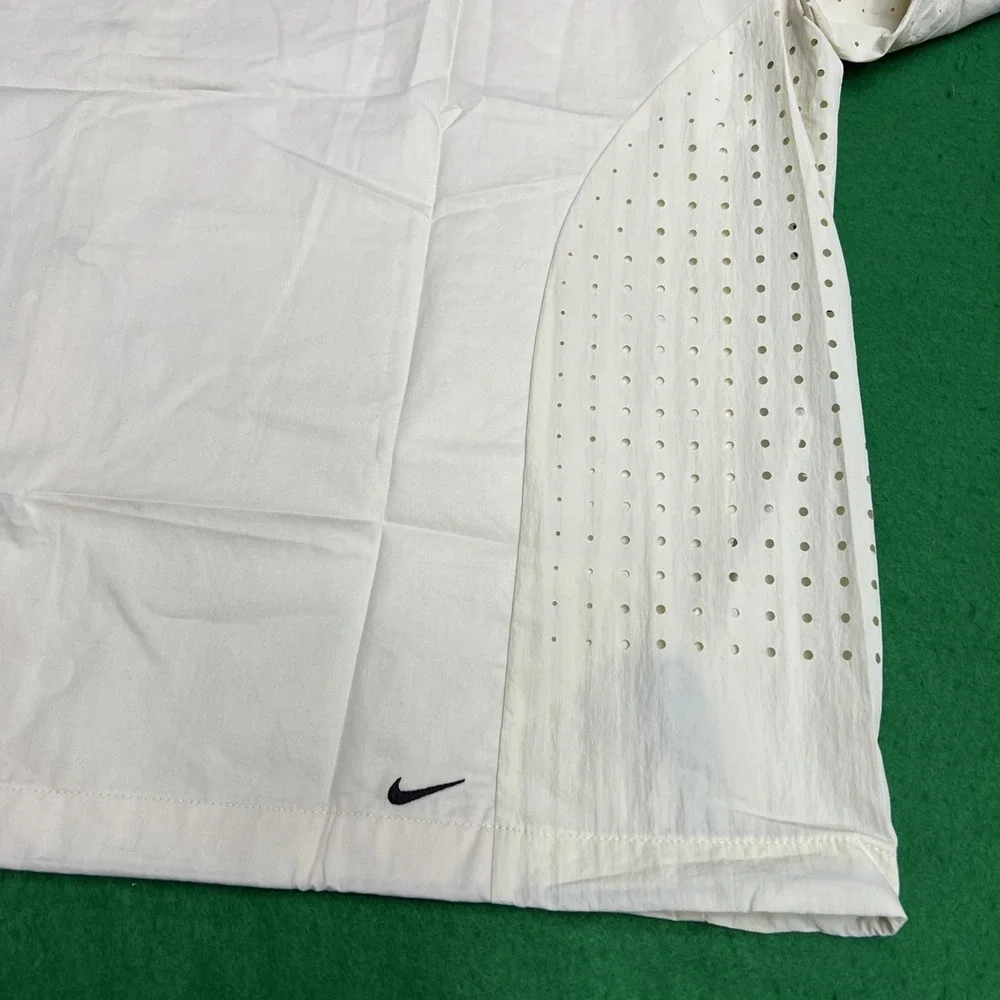 Nike tech button